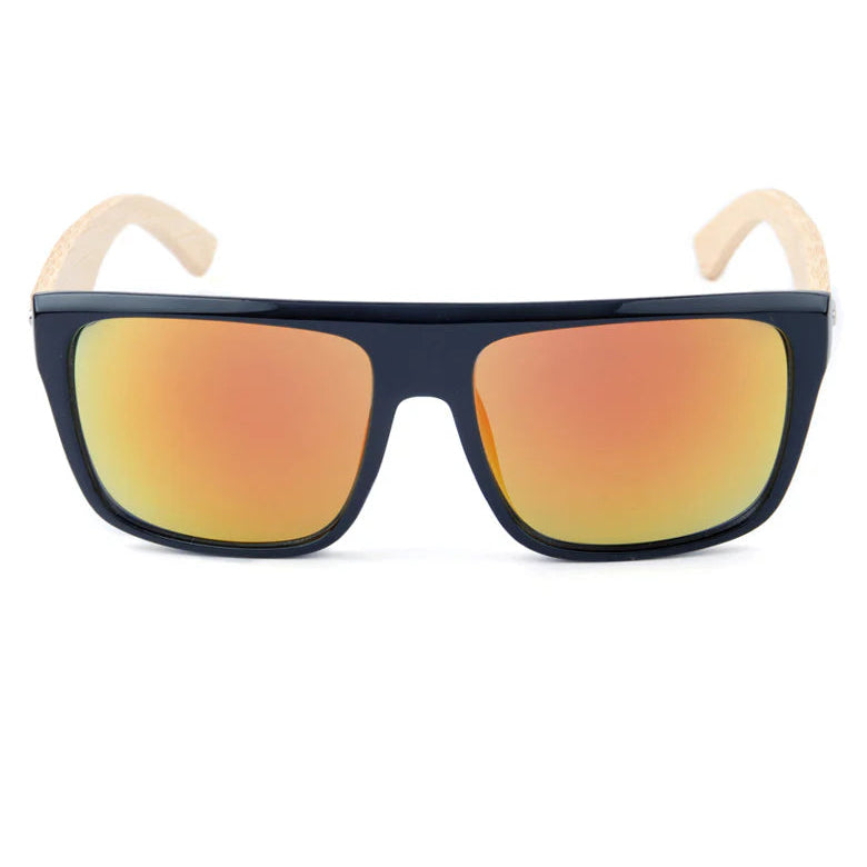 Sunglasses with black frame and orange-tinted lenses on a white background