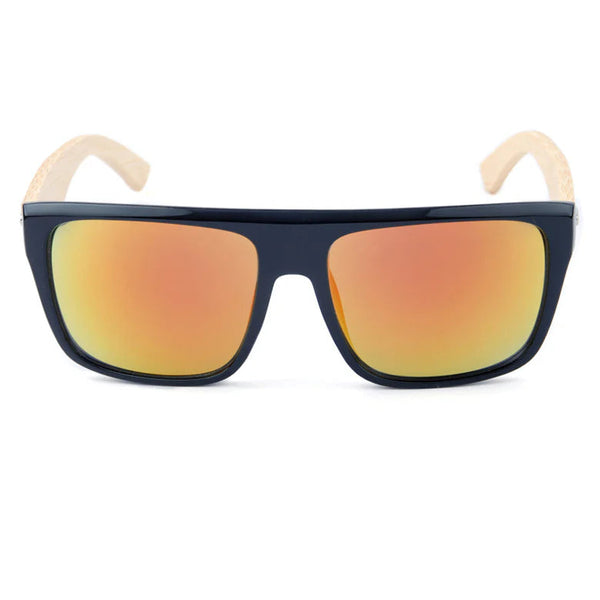 Sunglasses with black frame and orange-tinted lenses on a white background
