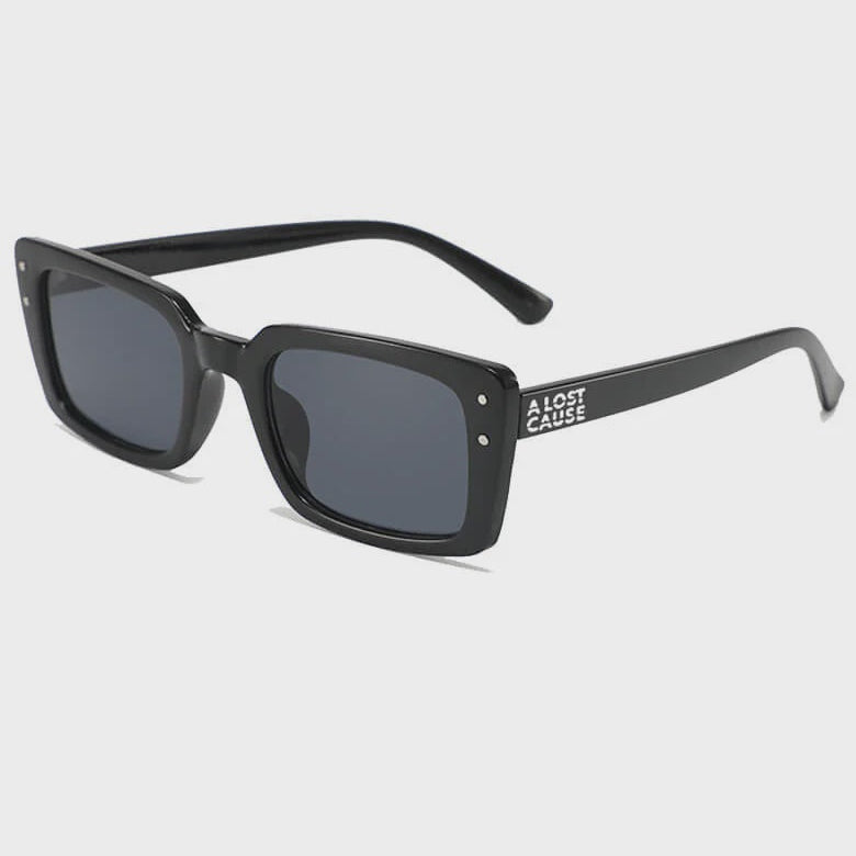 Black sunglasses with a brand logo on a white background