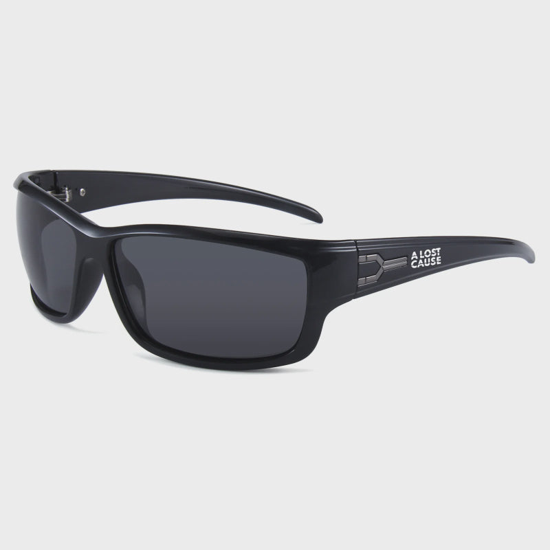 Black sunglasses with a brand logo on a light gray background