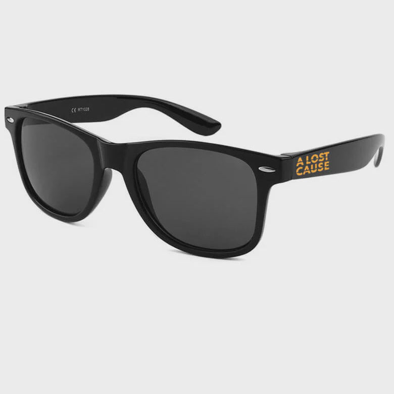Black sunglasses with a brand logo on a white background