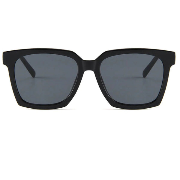 Black sunglasses with dark lenses on a white background