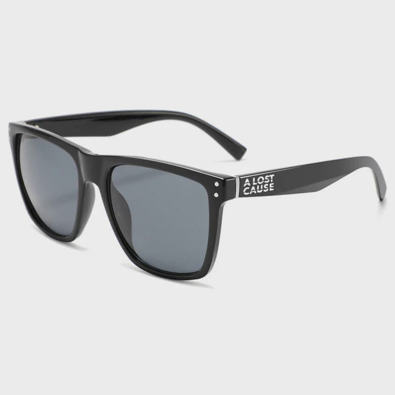 Black sunglasses with a brand logo on a white background