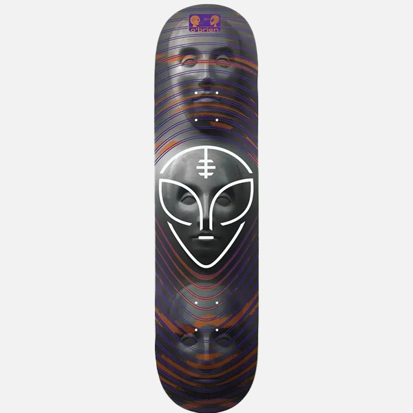 Skateboard deck with alien face design on a gray background