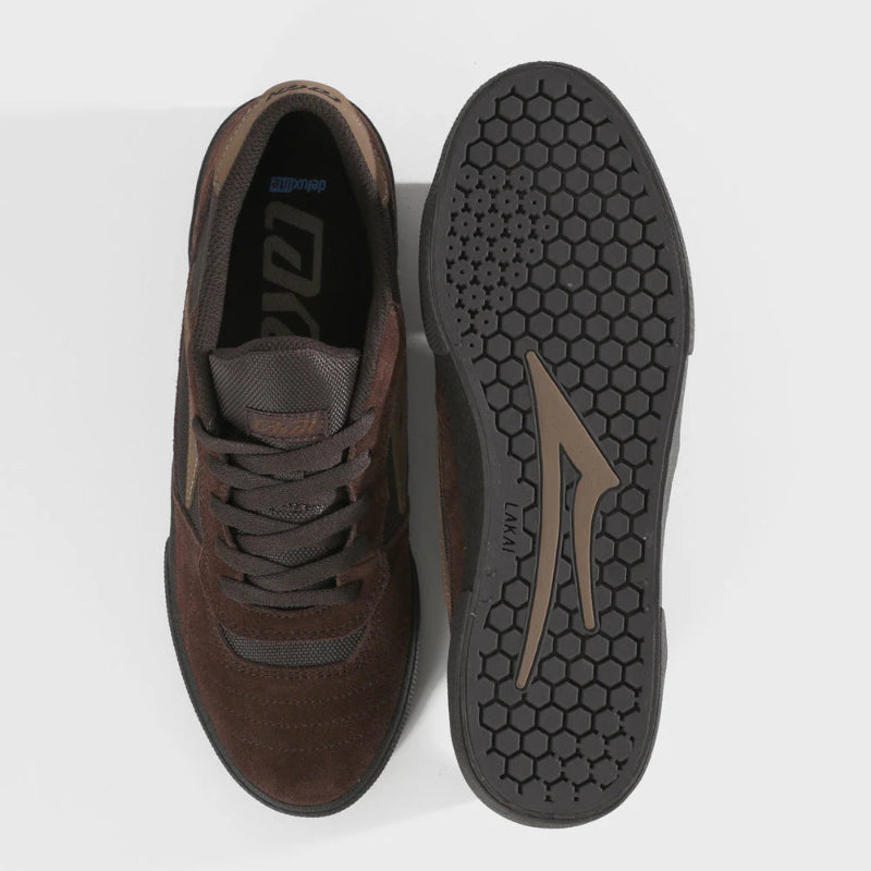 Brown sneaker with visible brand logo on a white background
