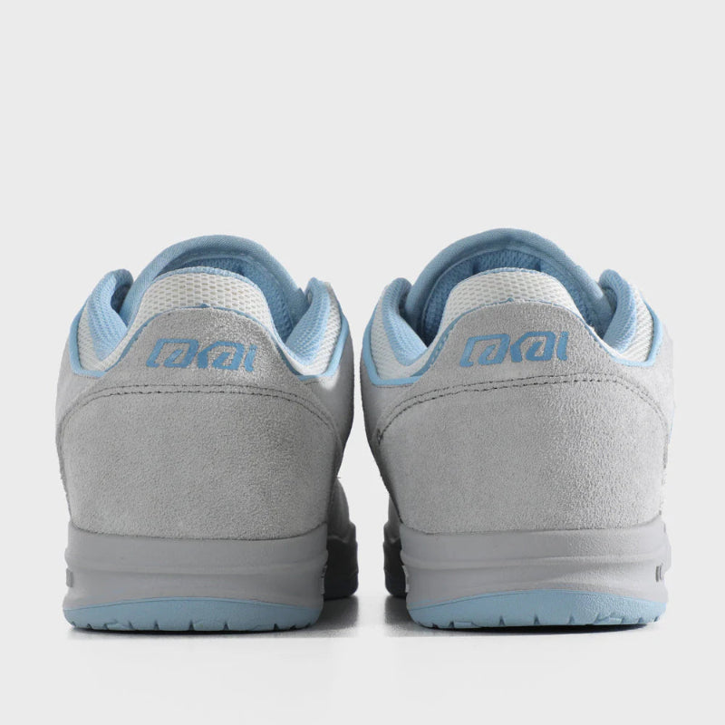 Gray sneakers with blue accents on a white background