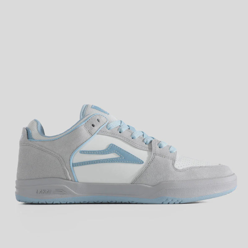 Gray and light blue sneaker on a gray background