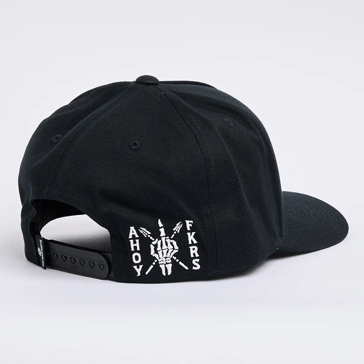 Black cap with white text and graphics on a light gray background
