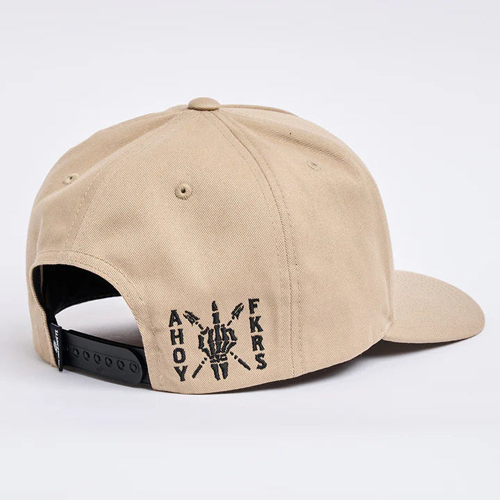 Beige cap with black text on a white background