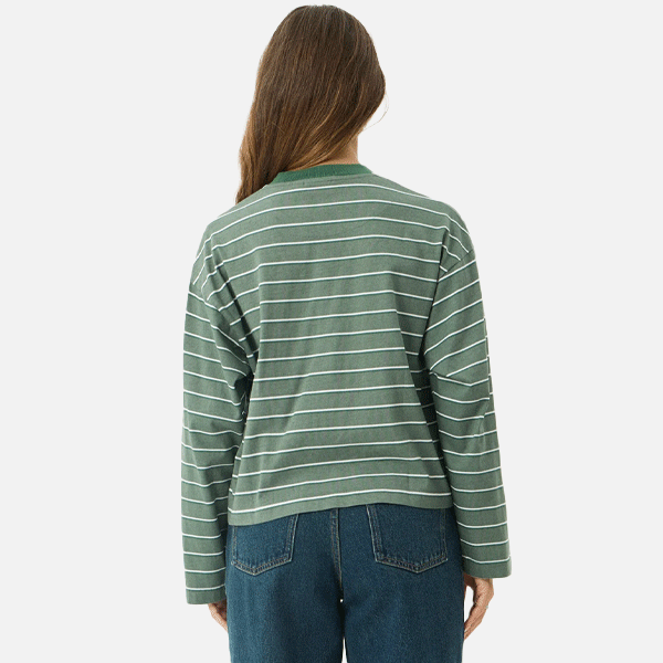 a women wearing a green t-shirt with white strips 