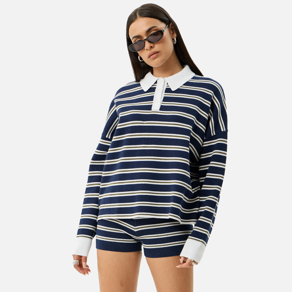 a women wearing a collared striped blue and white top