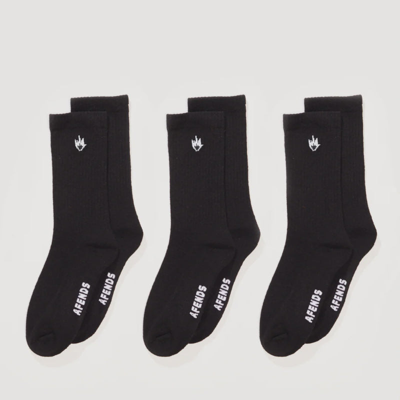 Three pairs of black socks with white text on a light gray background