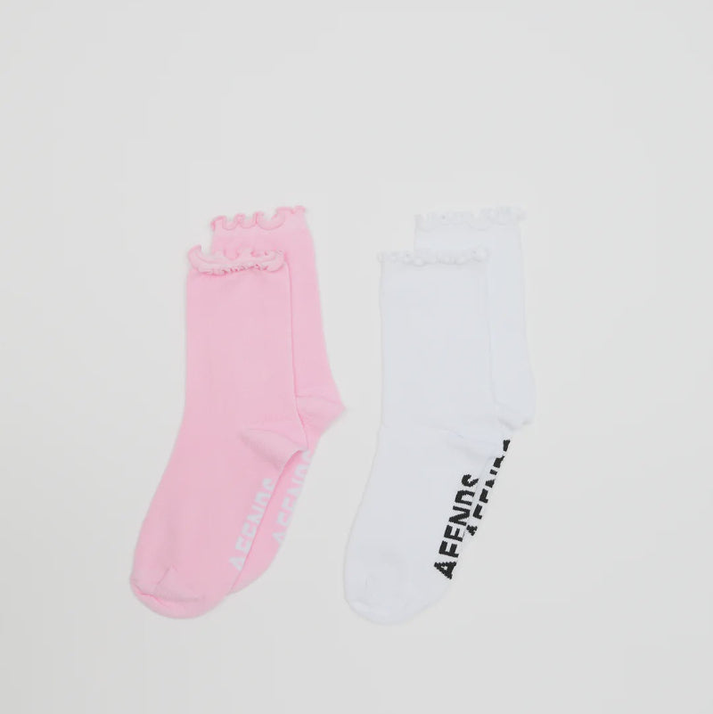 Pink and white socks with 'AFENDS' branding on a light gray background