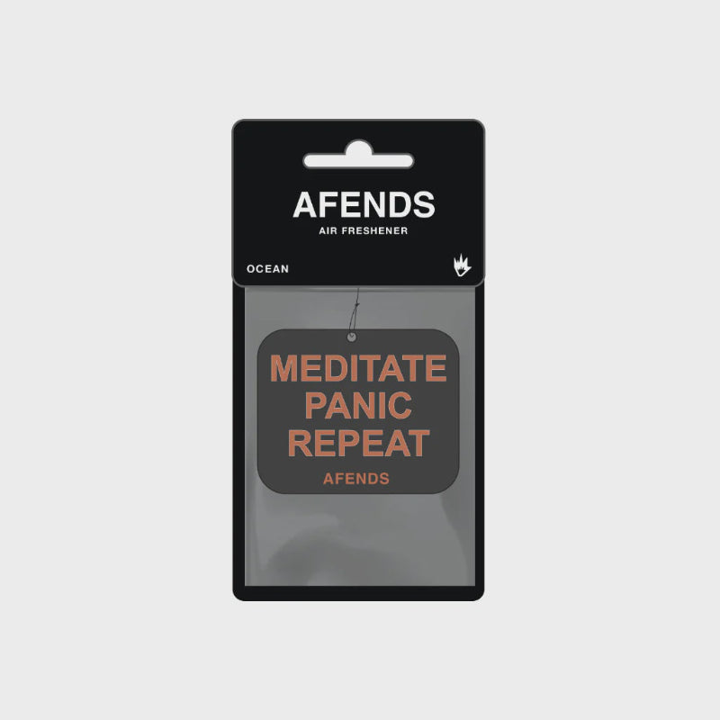 AFENDS air freshener packaging with 'Meditate Panic Repeat' text on a gray background