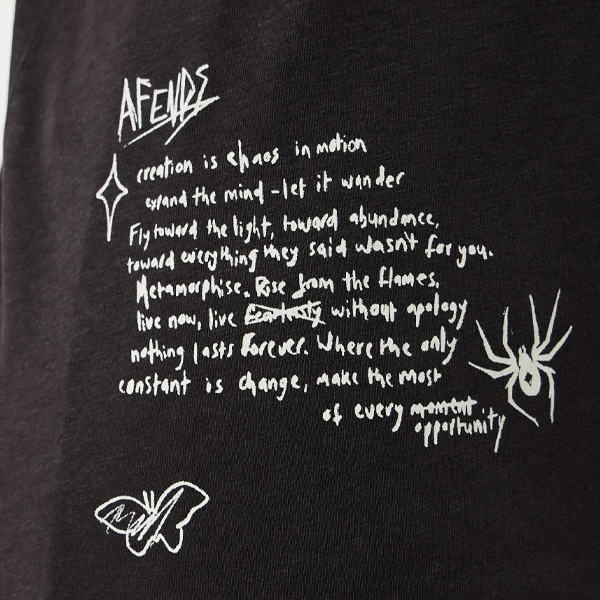 a black t-shirt with white righting
