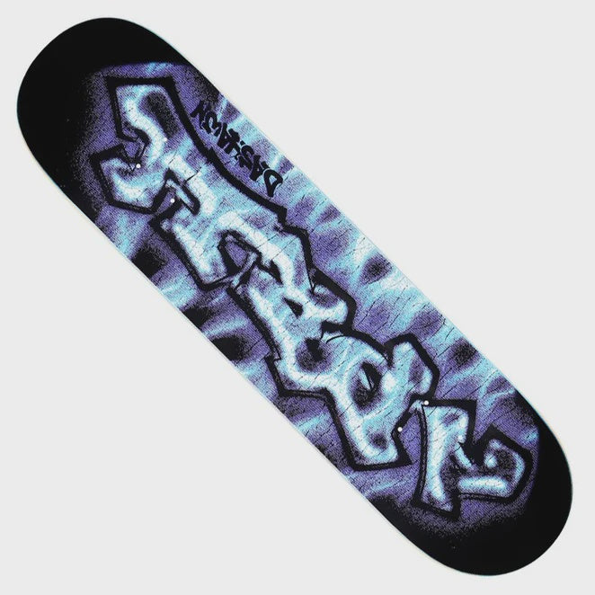 A skateboard deck featuring a black background with a large graffiti-style graphic in light blue, purple, and white, with the brand name 'Skatec' printed near the top.