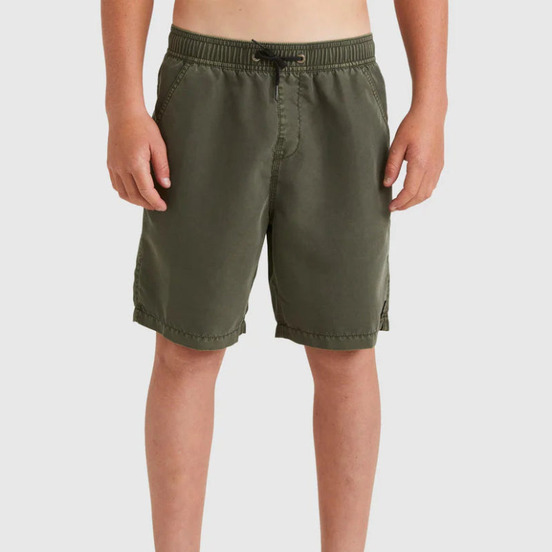 Person wearing olive green shorts on a white background