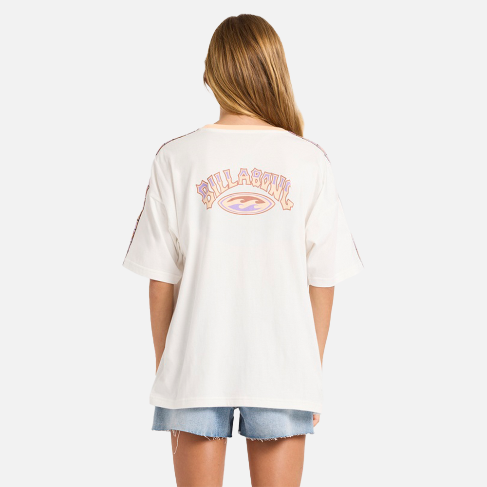 Person wearing a white t-shirt with a logo on the back against a plain background