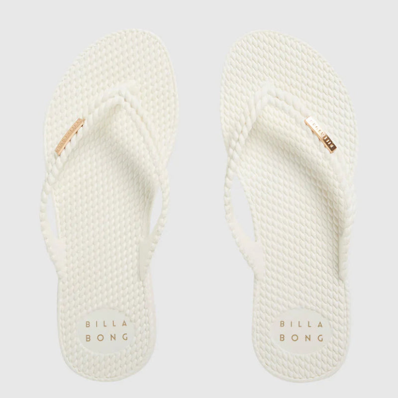 Pair of white flip-flops with 'Billa Bong' branding on a light gray background