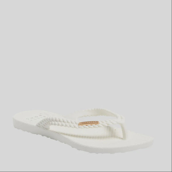 White sandal on a light gray background