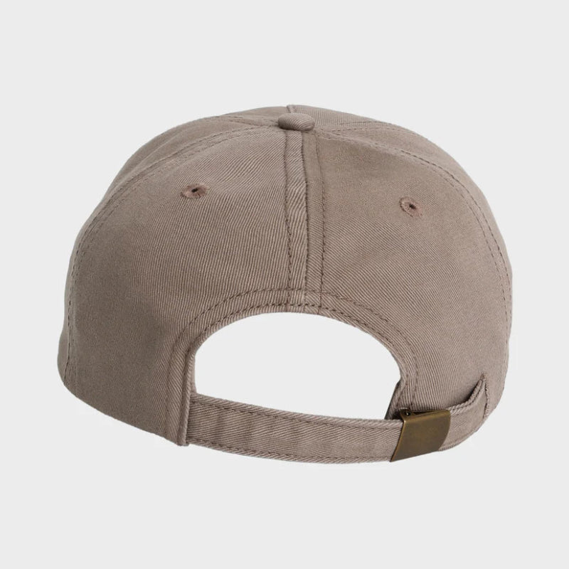 Beige baseball cap on a light gray background