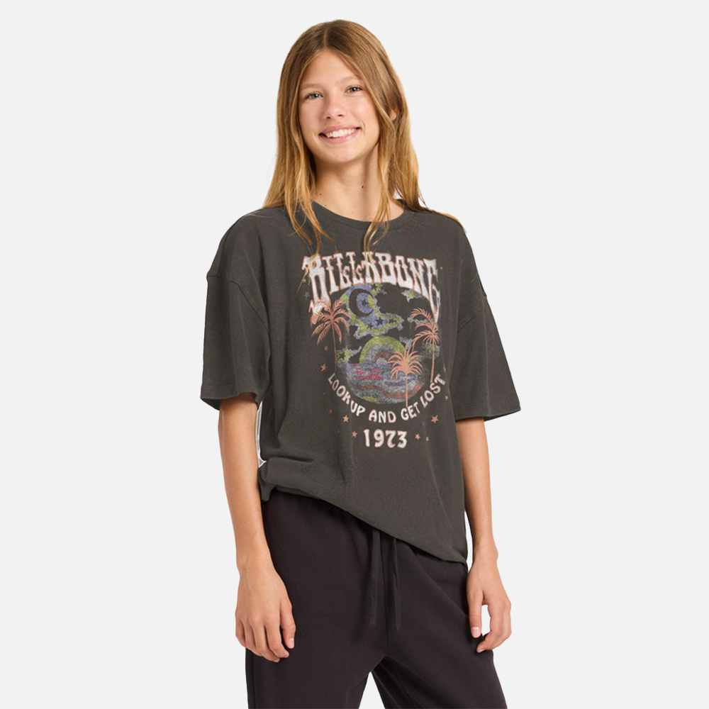 Person wearing a dark gray t-shirt with a colorful graphic design on a white background