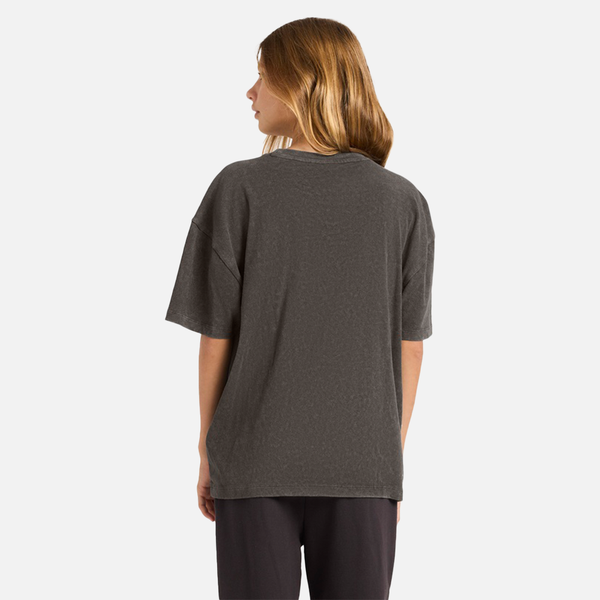 Person wearing a dark gray t-shirt on a white background