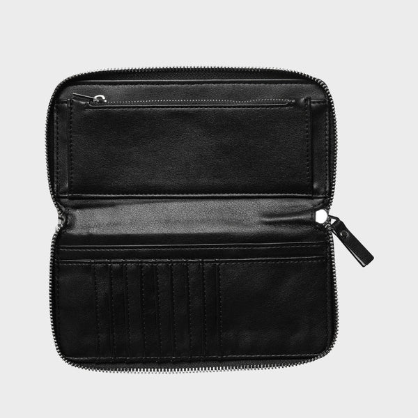 Black leather wallet with open design on a light gray background