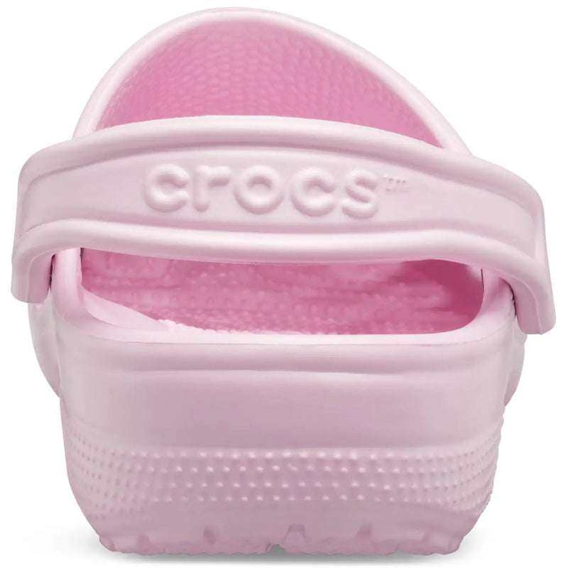 Pink Crocs sandal on a white background