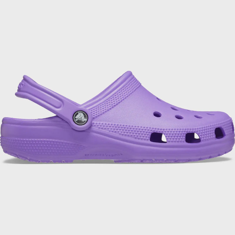 Purple clog shoe on a light gray background