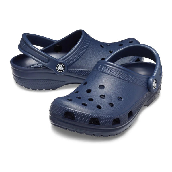 Navy blue clogs on a white background