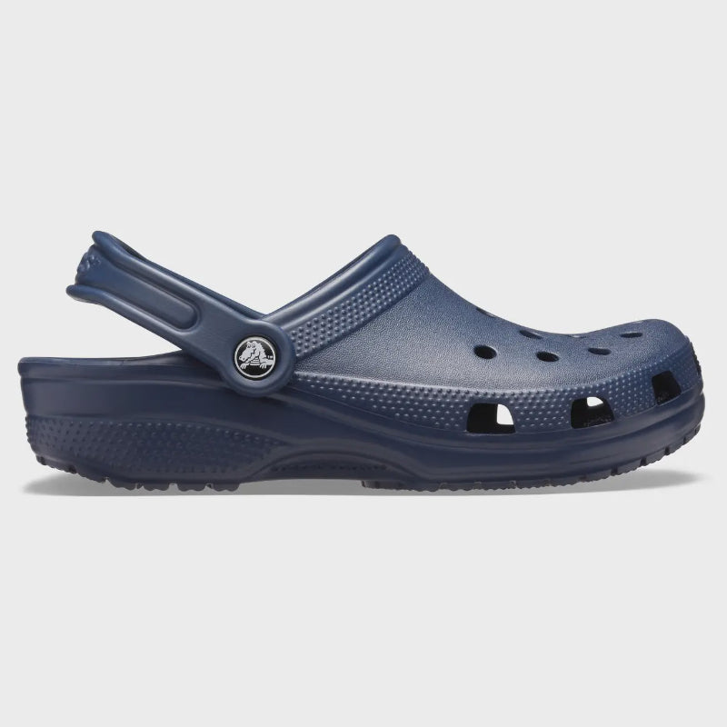 Navy blue clog shoe on a light gray background