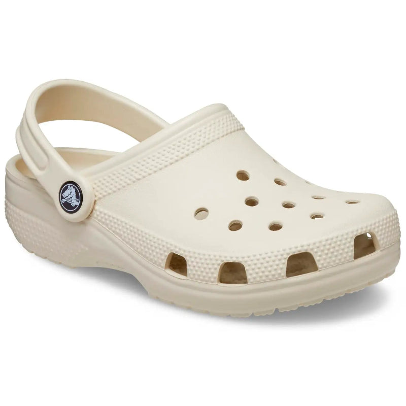 Beige clog shoe on a white background
