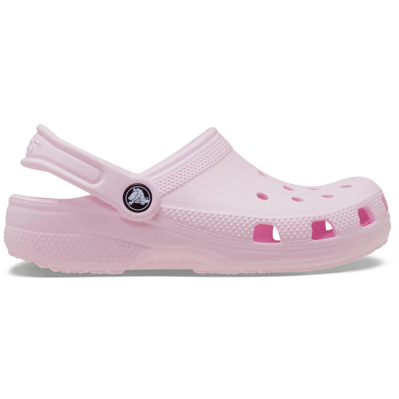 Pink clog shoe with a small logo on a white background