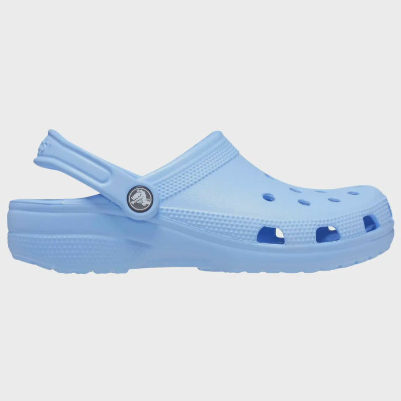 Light blue clog shoe on a light gray background