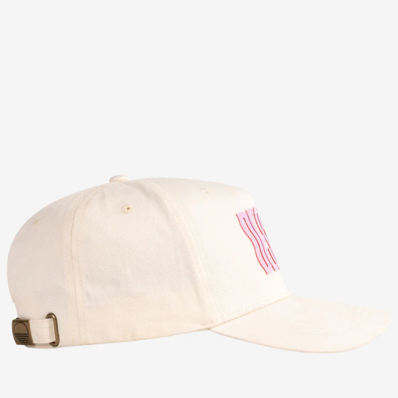 Beige cap with pink logo on a white background