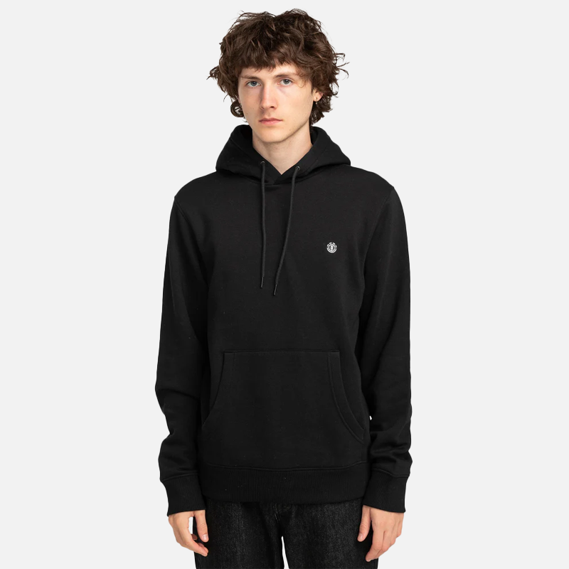 Person wearing a black hoodie with a small logo on a white background