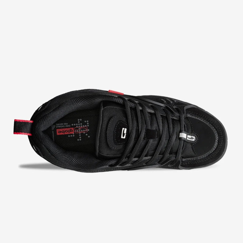Black sneaker with red accents on a white background