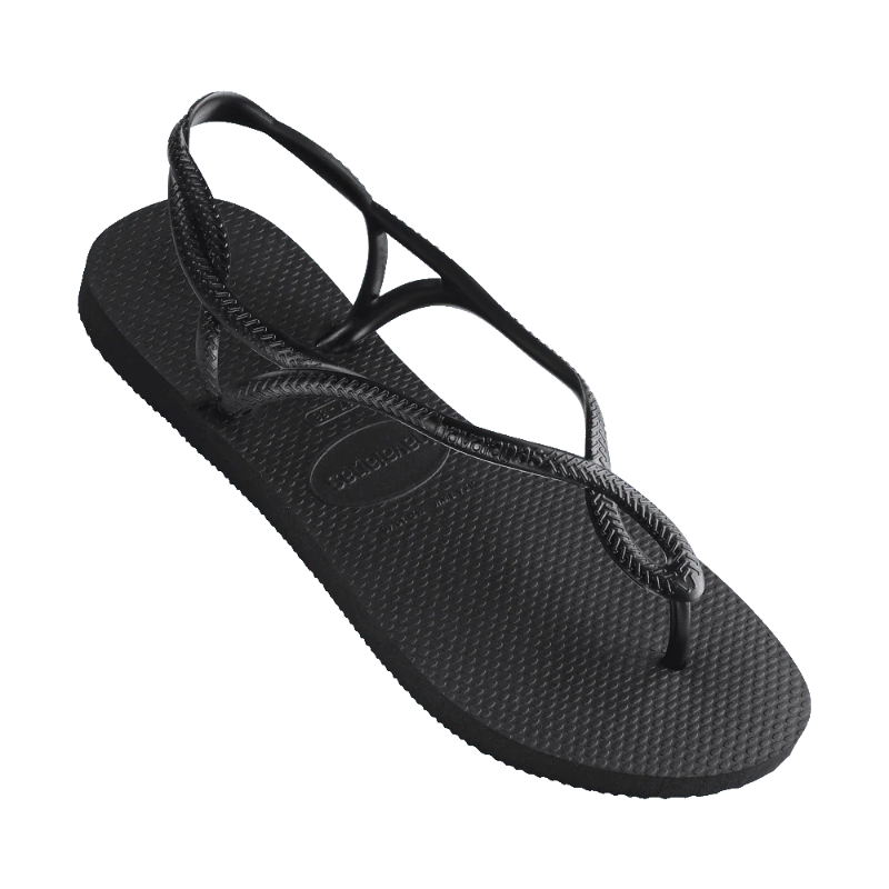 Black sandal with a strap on a white background