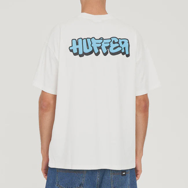 Person wearing a white t-shirt with 'Huffer' logo on the back against a light gray background