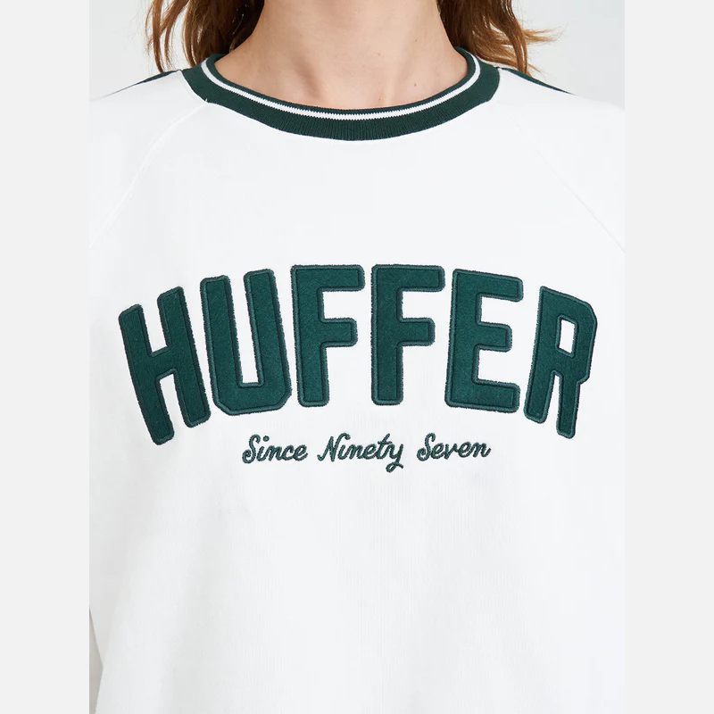 White sweatshirt with 'HUFFER Since Ninety Seven' text on a white background