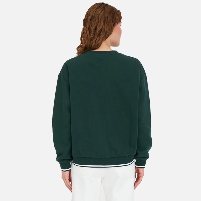 Person wearing a dark green sweatshirt on a white background