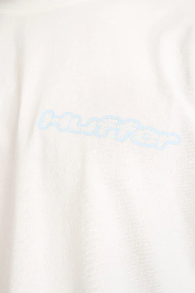 White t-shirt with blue graphic design on a white background