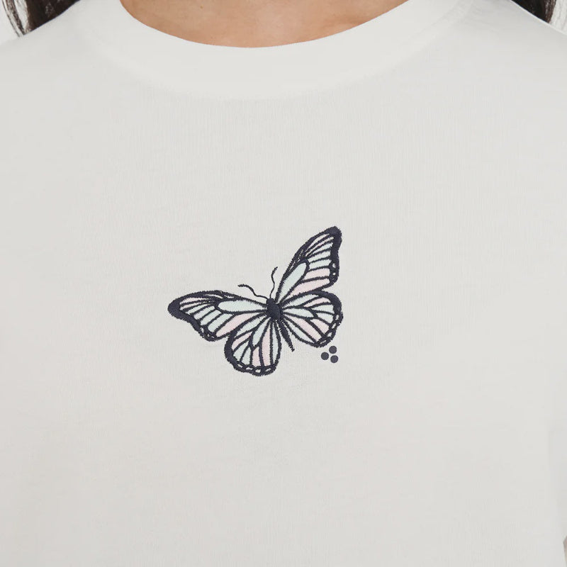 White t-shirt with a black butterfly design on a plain background
