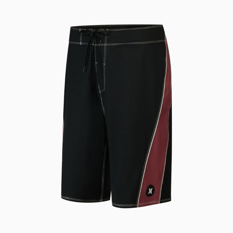 Black board shorts with a diagonal burgundy side panel and a small Hurley logo near the hem, shown on a light gray background.