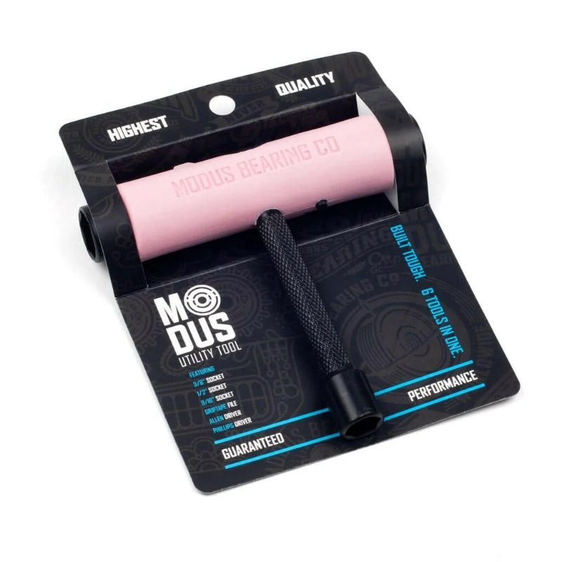 Pink skate tool with black packaging featuring Modus branding on a white background
