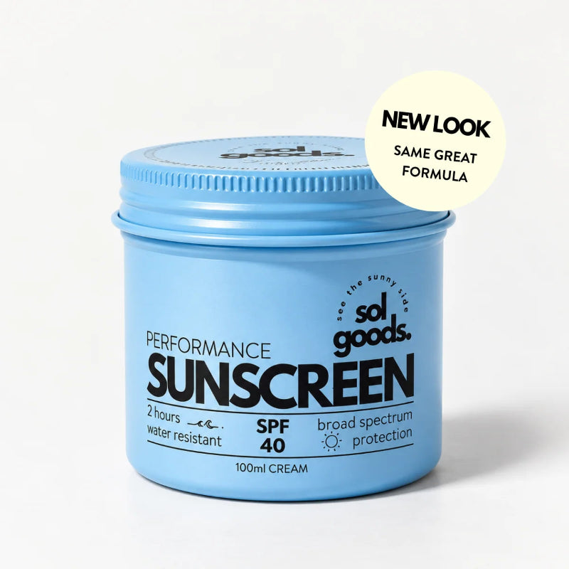A light blue plastic jar of Sol Goods Performance Sunscreen SPF 40, featuring a matching blue screw-on lid and a white circular badge in the top right corner that reads 'NEW LOOK SAME GREAT FORMULA'.