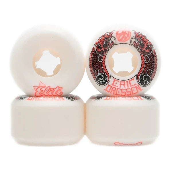 Four white skateboard wheels stacked in a 2x2 arrangement on a white background. One wheel is shown from the side with a red 'Elite' logo, and one wheel is shown from the face with a red and black graphic design featuring the text 'ERIC DRESSEN' 