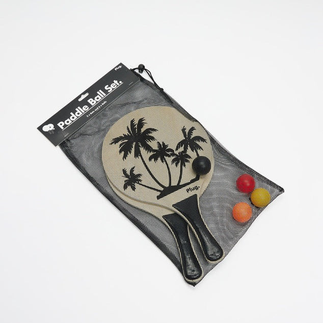 Paddle ball set with two paddles and three balls in a mesh bag on a white background
