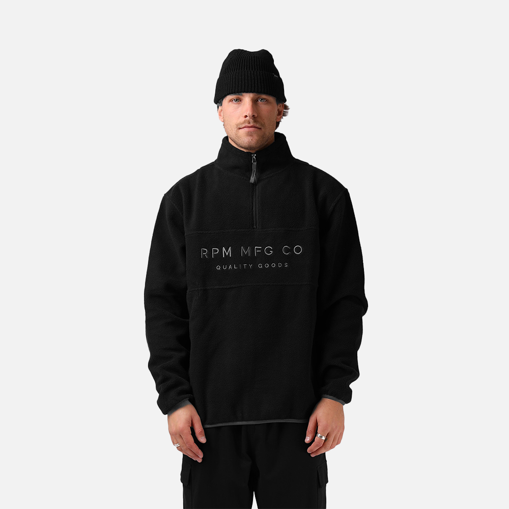 Person wearing a black RPM MFG CO pullover on a white background